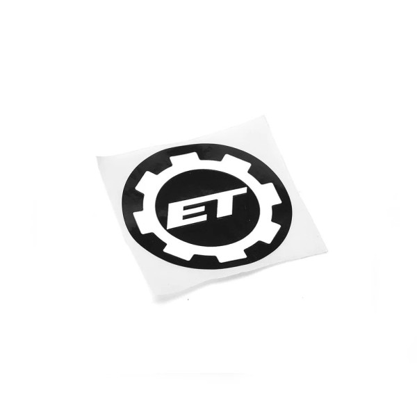 Eemann Tech Gear Logo Sticker - Black - 40mm  Chez DEVILLE ARMORY. Votre armurerie en ligne.